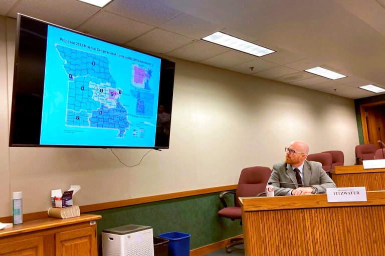 Missouri state Rep. Travis Fitzwater looks at a newly proposed map for dividing up Missouri's congressional districts