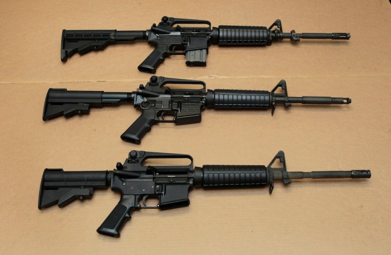 FILE - Three variations of the AR-15 assault rifle are displayed at the California Department of Justice in Sacramento, Calif., on Aug. 15, 2012.(AP Photo/Rich Pedroncelli, File)