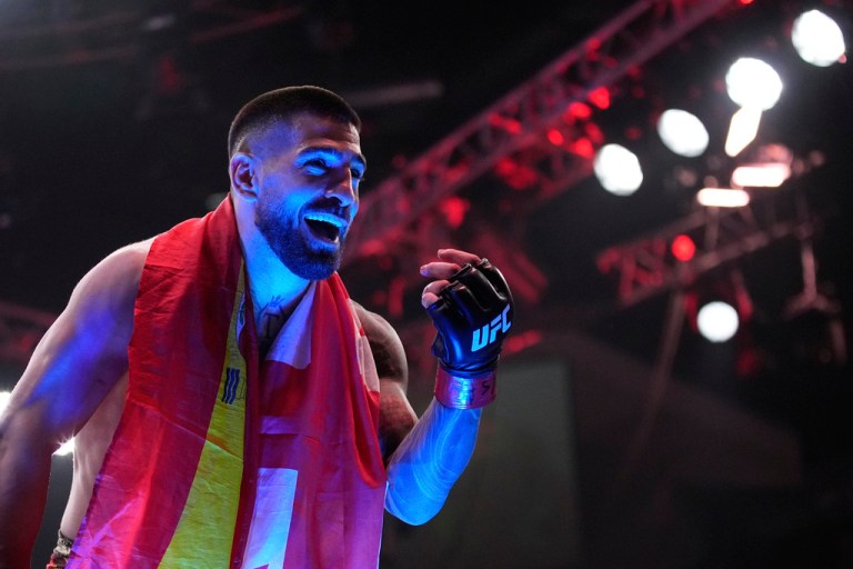 Ilia Topuria celebrates after defeating Charles Oliveira