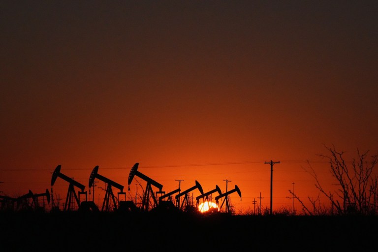 Pumpjacks work to extract oil as the sun rises in Midland, Texas, Jan. 20, 2025.