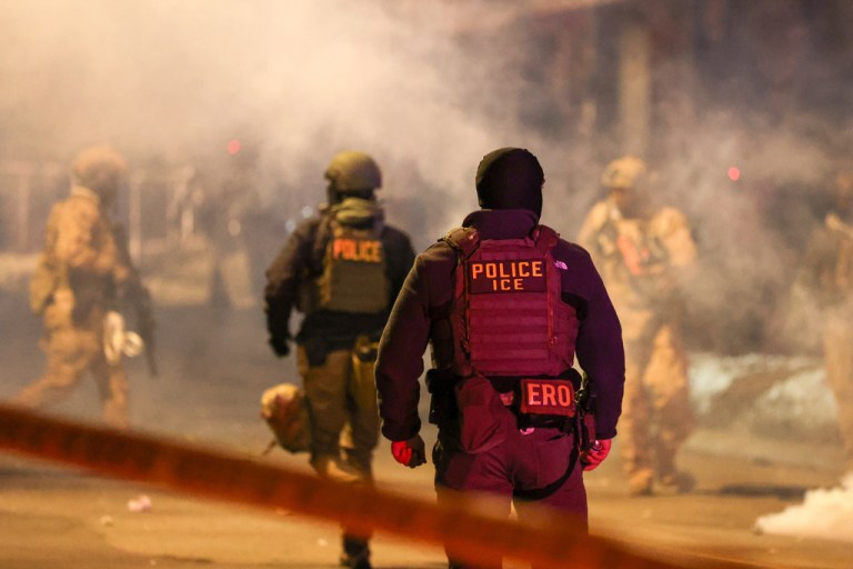 Federal law enforcement deploys gas at the site of a reported shooting in North Minneapolis, United States, on January 14, 2026. The Department of Homeland Security confirms a shooting involving federal officers on January 14, 2026, in North Minneapolis, United States. (Photo by Steven Garcia/NurPhoto via AP)