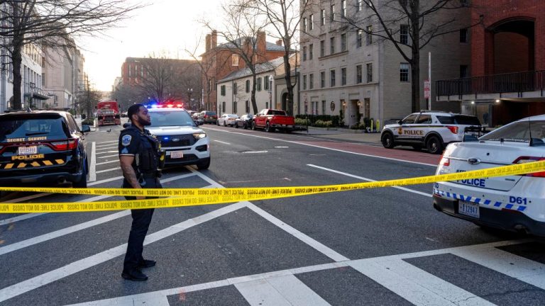 Washington Metropolitan Police Department officers block the streets around the White House.