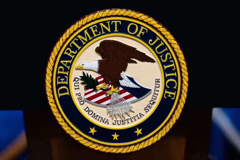 U.S. Department of Justice logo.
