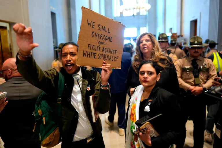 Tennessee state Rep. Justin Jones (D) protests outside the House chamber.