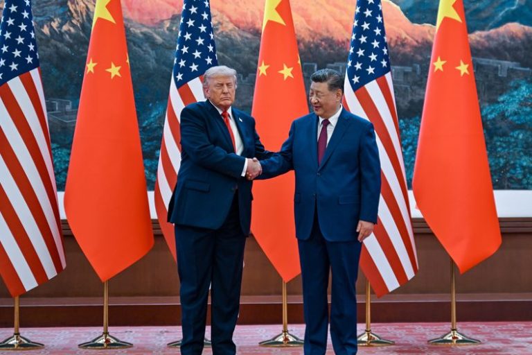 Chinese President Xi Jinping, right, shakes hands with U.S. President Donald Trump at the Great Hall of the People in Beijing, Thursday, May 14, 2026.