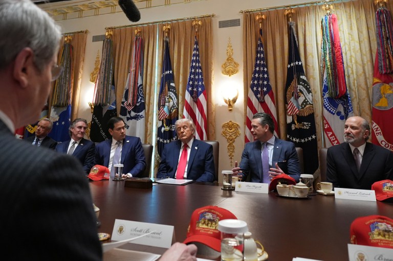 President Donald Trump, center, attends a Cabinet meeting at the White House, Wednesday, May 27, 2026, in Washington.
