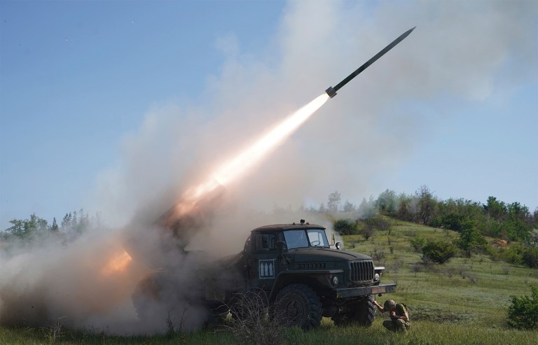 Soldiers of Ukraine’s 30th Separate Mechanized Brigade fire a rocket toward Russian positions at the front line in the Donetsk region of Ukraine. (Andrii Marienko/AP)