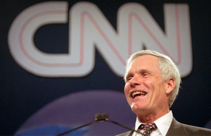 Ted Turner speaks during the CNN World Report Contributors banquet in Atlanta on May 4, 1995. (John Bazemore/AP)