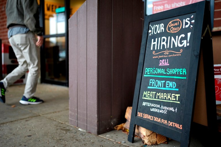 Hiring sign is displayed at a grocery store in Glenview, Ill., Monday, Nov. 25, 2024.