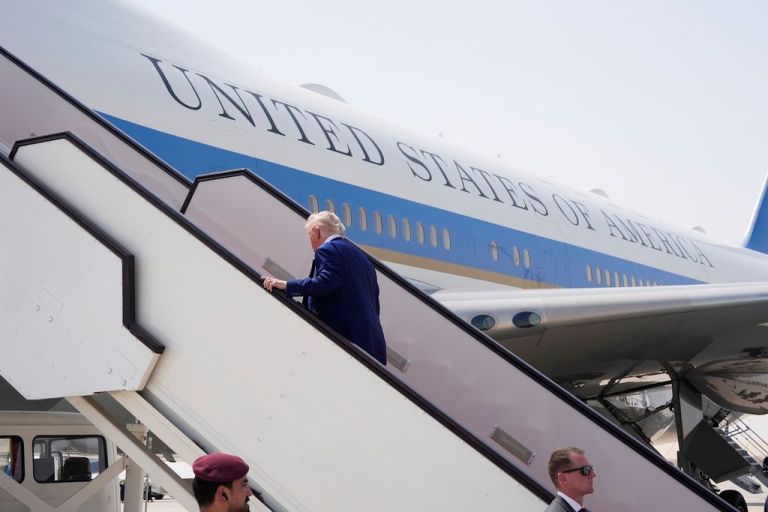 Trump boards Air Force One.
