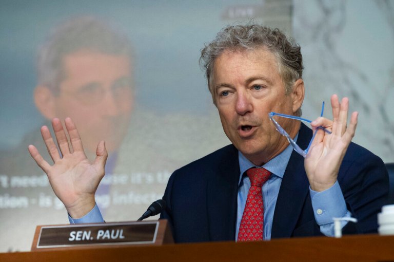 Sen. Rand Paul, R-Ky, questions Anthony Fauci, Director, National Institute of Allergy and Infectious Diseases, National Institutes of Health, while displaying a video and poster of Fauci, during the Senate Health, Education, Labor, and Pensions hearing to examine stopping the spread of monkeypox, focusing on the Federal response, in Washington, Wednesday, Sept. 14, 2022.