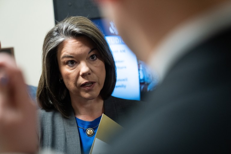 Rep. Angie Craig, D-Minn., speaks to members of the media about President Donald Trump's threats to invoke Insurrection Act in Minnesota at the Capitol, Thursday, Jan. 15, 2026, in Washington.