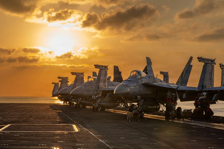 This image provided by U.S. Central Command shows aircraft on the flight deck of the USS Abraham Lincoln (CVN 72) that are operating in support of the war in Iran, on Tuesday, March 3, 2026.