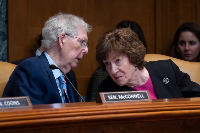 Sen. Mitch McConnell (R-KY), chairman of the Senate Defense Appropriations Subcommittee, left, confers with Sen. Susan Collins (R-ME) chairwoman of the Senate Appropriations Committee.