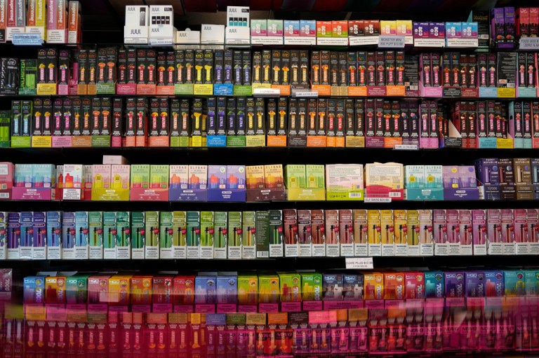 Disposable flavored electronic cigarette devices are displayed for sale at a store in Pinecrest, Fla., June 26, 2023. (AP Photo/Rebecca Blackwell, File)