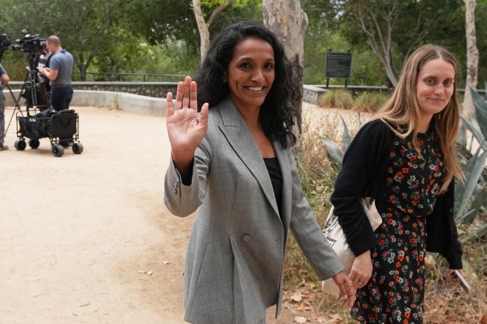 Nithya Raman, a candidate in the Los Angeles mayoral race, waves after a news conference Thursday, May 28, 2026, in Los Angeles.