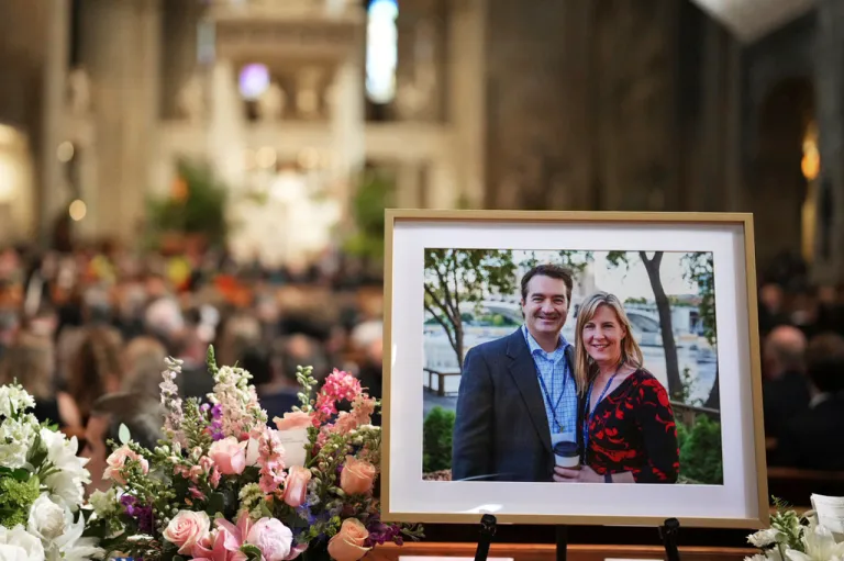A photo of Mark and Melissa Hortman is displayed during their funeral service