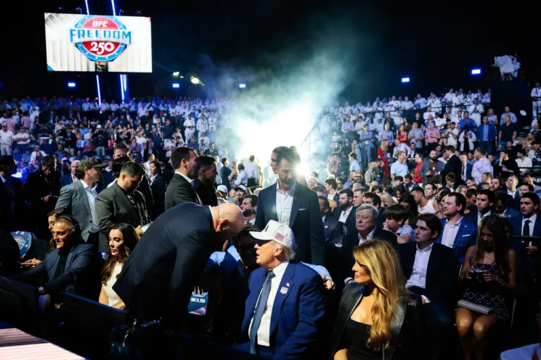 President Donald Trump speaks to UFC President Dana White during UFC Freedom 250 at the White House.