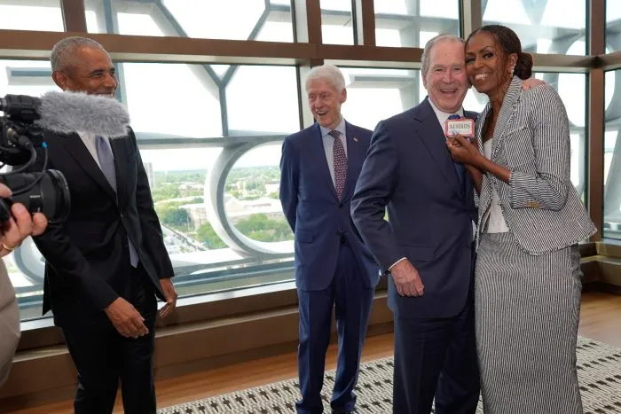 Why George W Bush handed Altoids to Michelle Obama at her husband’s presidential center opening