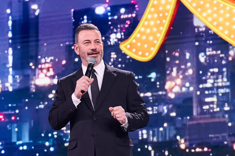 Jimmy Kimmel talking into a microphone.