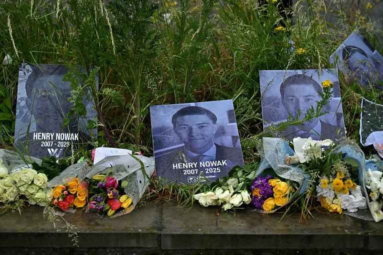 Floral tributes for Henry Nowak are pictured outside of Portswood Police Station in Southampton, southern England, on June 3, 2026. (Ben STANSALL / AFP via Getty Images)