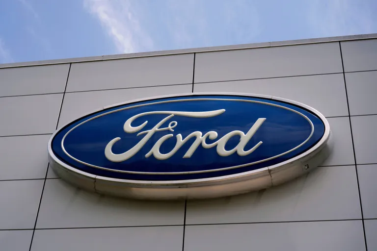 The Ford logo above the entrance to the Ford Motor Company Kentucky Truck Plant.