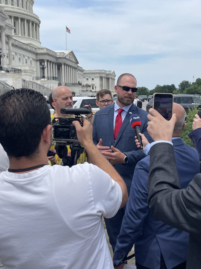 UFO whistleblower and retired U.S. Air Force Maj.David Grusch speaks at a press conference.