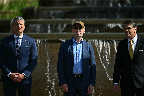 (L/R) US Secretary of Defense Pete Hegseth, White House Deputy Chief of Staff Stephen Miller, and Acting Attorney General Todd Blanche attend a "DC Safe and Beautiful Task Force" ceremony with the National Guard at Meridian Hill Park in Washington, DC, on July 2, 2026.